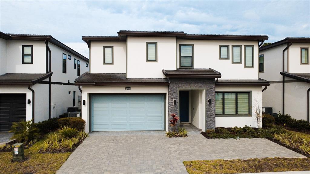 1282 Butterfly Orchid Road Davenport, FL 33837 - Photo 2 of 57