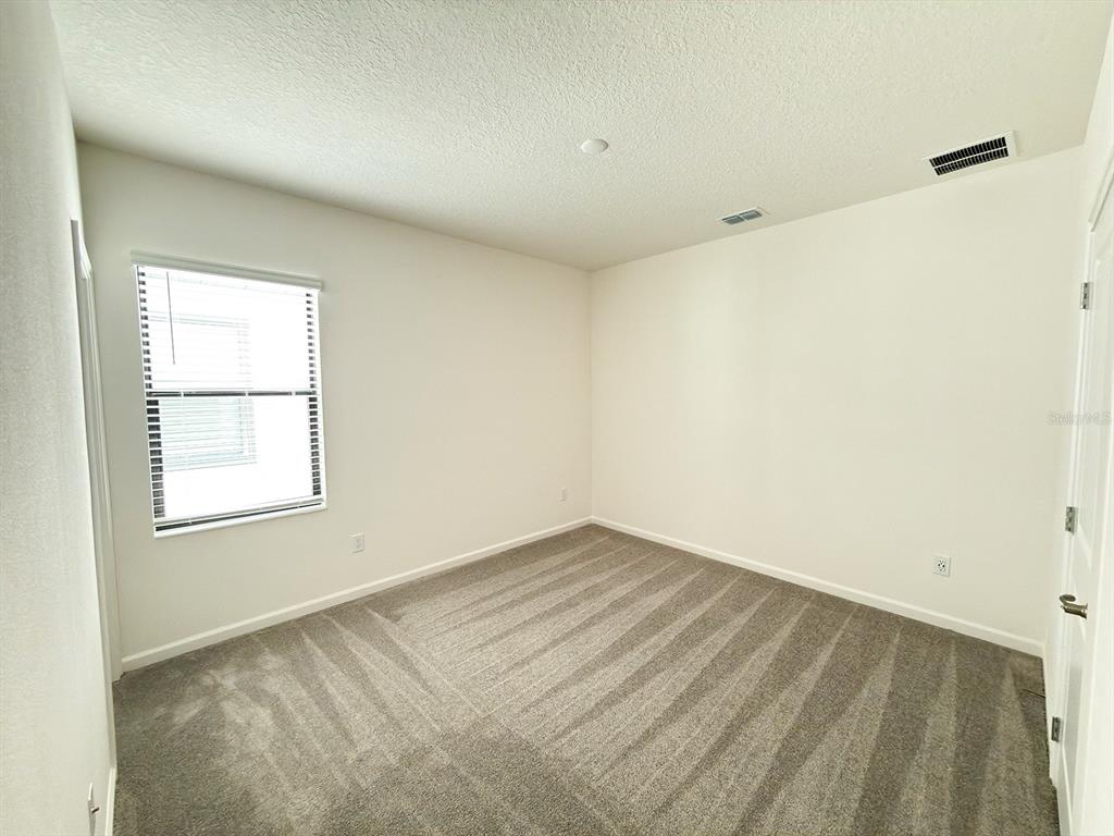 1282 Butterfly Orchid Road Davenport, FL 33837 - Photo 24 of 57