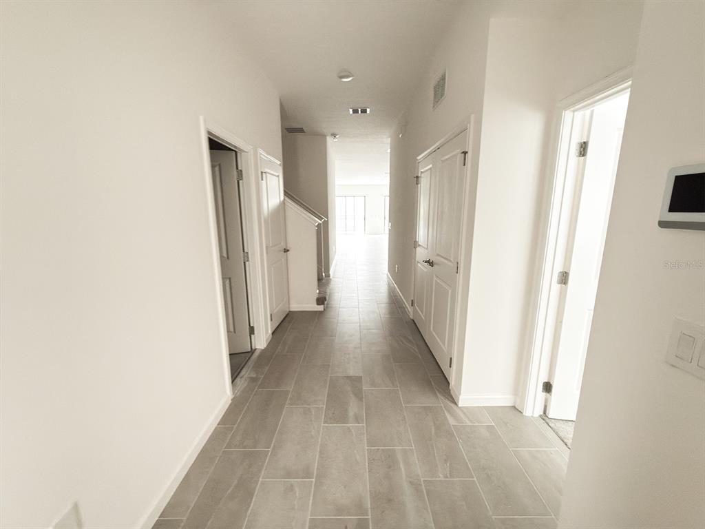 1282 Butterfly Orchid Road Davenport, FL 33837 - Photo 4 of 57