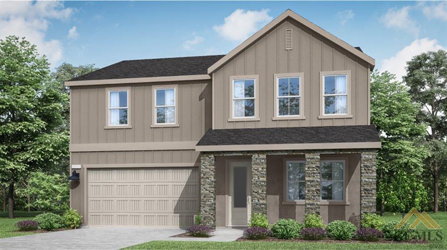 a front view of a house with garage