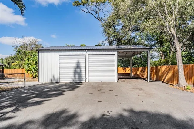 a view of a backyard with a patio