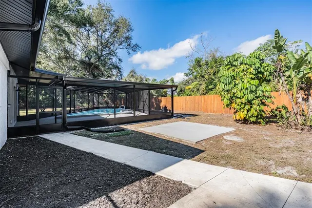 a view of backyard with green space