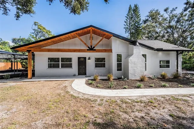 a front view of a house with entertaining space