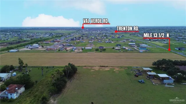a view of a street with an ocean view