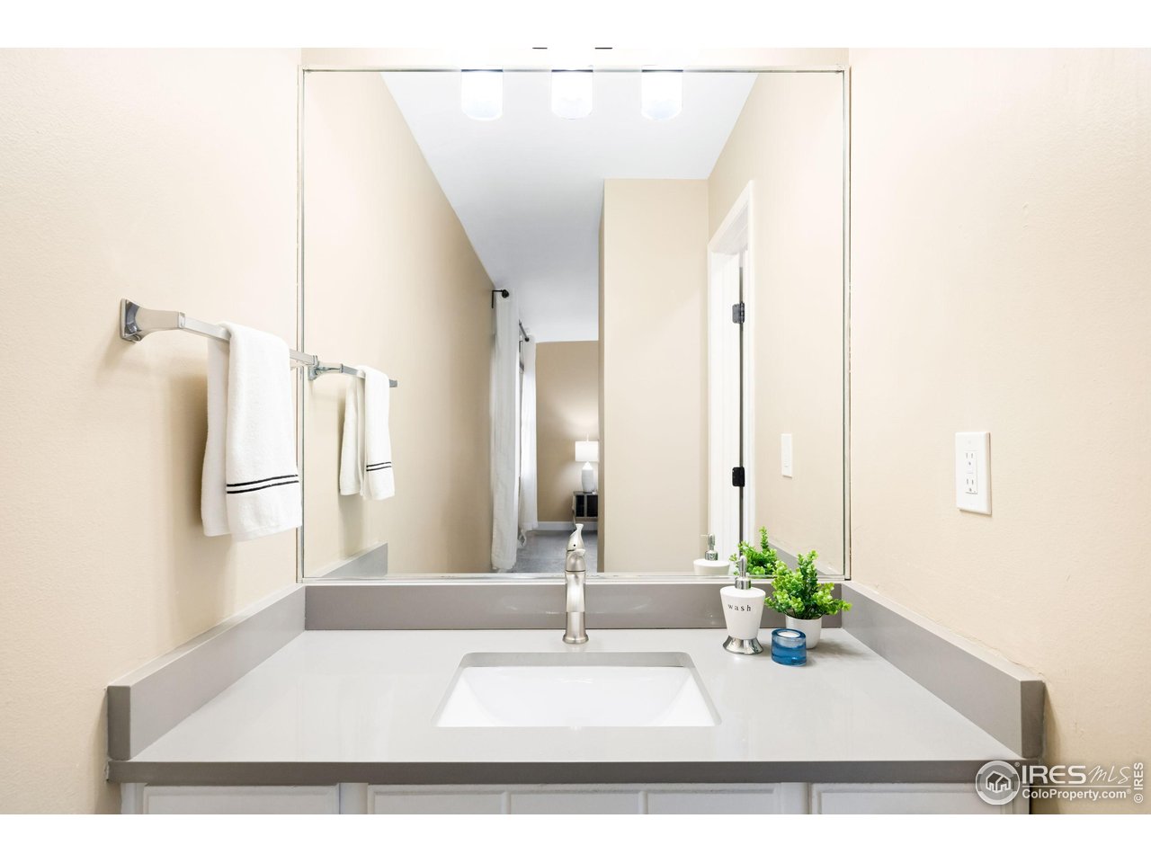 93 Benthaven Place Boulder, CO 80305 - Photo 22 of 37 a bathroom with a sink and a mirror