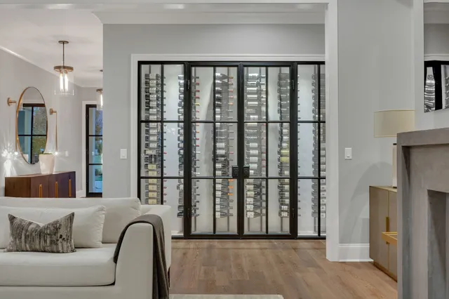 a bathroom with a toilet sink vanity and mirror