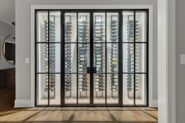 a spacious bedroom with a bed and window