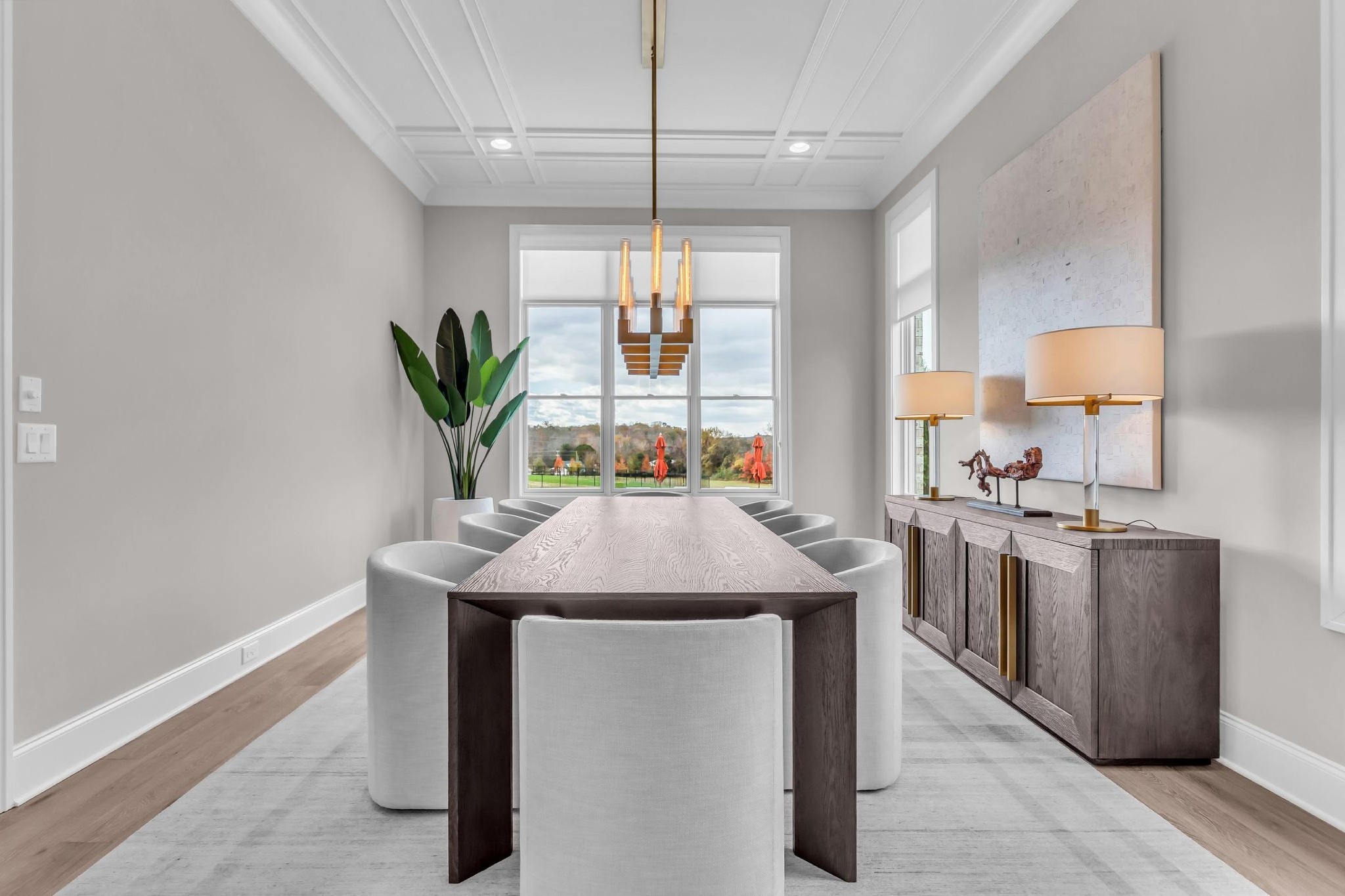 6313 Percheron Lane Arrington, TN 37014 - Photo 28 of 87 a kitchen with stainless steel appliances granite countertop a sink a stove a chimney a potted plant and a window