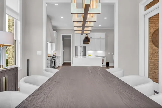 a bed room with a bed and a chair