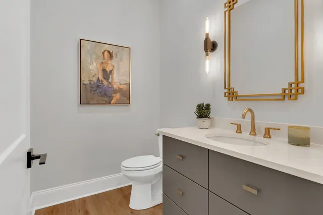 a living room with furniture gym equipment and a large window