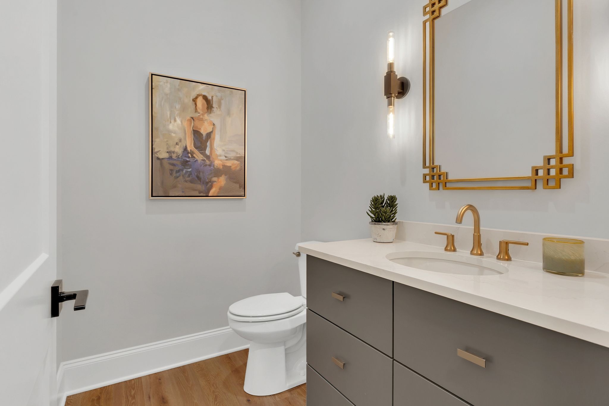 6313 Percheron Lane Arrington, TN 37014 - Photo 32 of 87 a bathroom with a toilet sink vanity and mirror