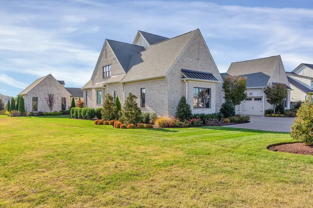 a front view of house with an outdoor space