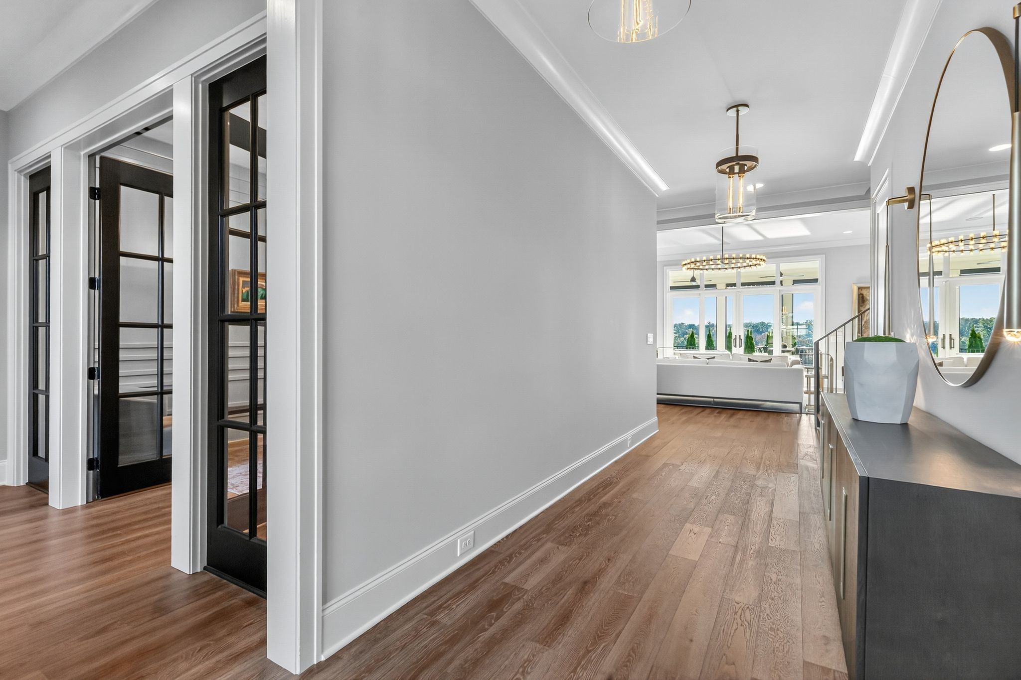 6313 Percheron Lane Arrington, TN 37014 - Photo 6 of 87 a view of hallway with living room and wooden floor