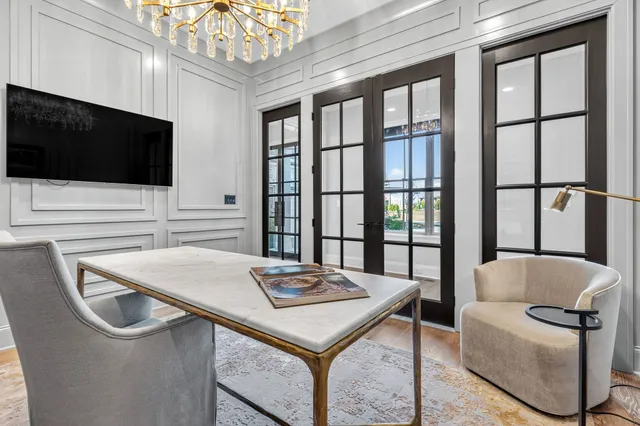 a living room with fireplace furniture and a flat screen tv