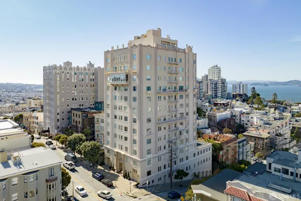 a view of a city with tall buildings