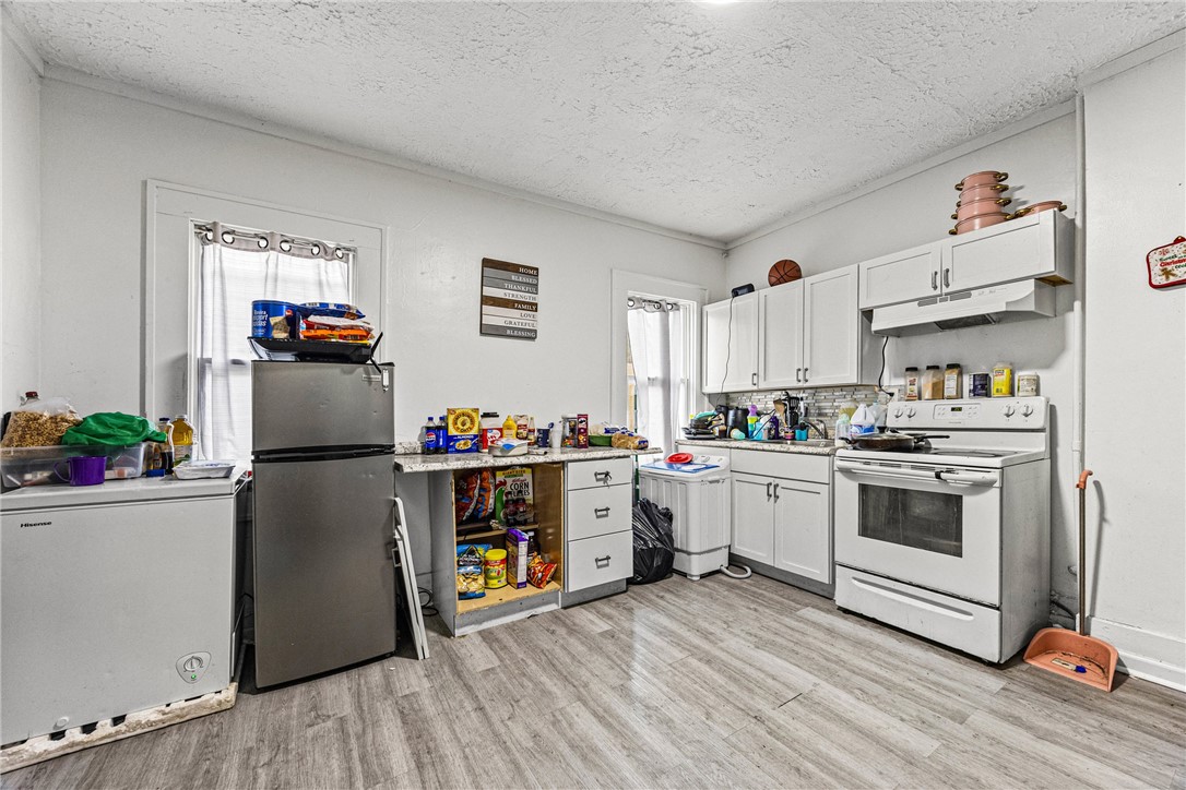 641 Jay Street Rochester, NY 14611 - Photo 15 of 29 Lower unit kitchen