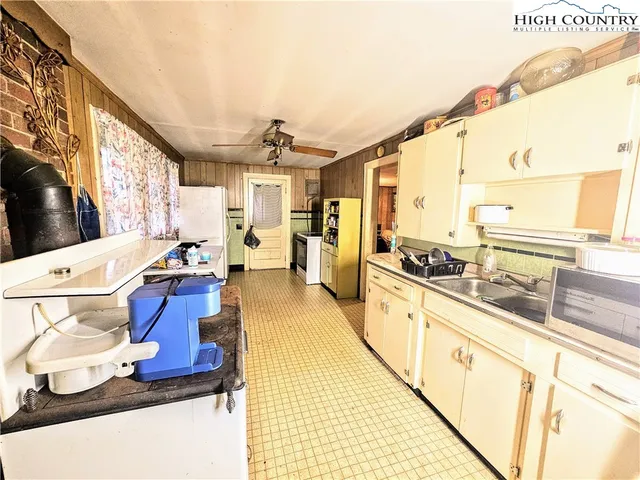 a very nice looking living room with a large window
