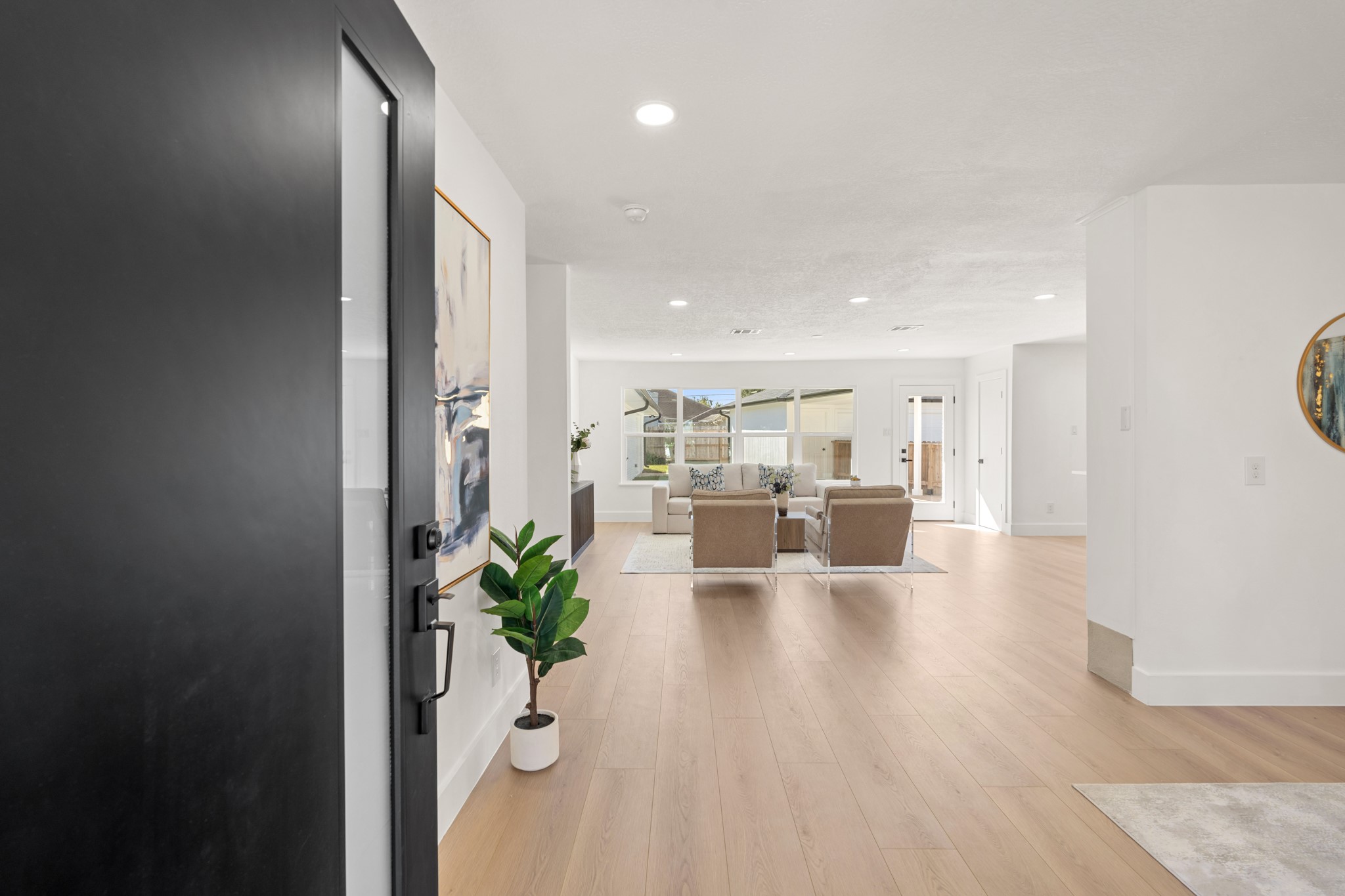 7631 Westwind Lane Houston, TX 77071 - Photo 3 of 21 a view of a living room and kitchen with furniture