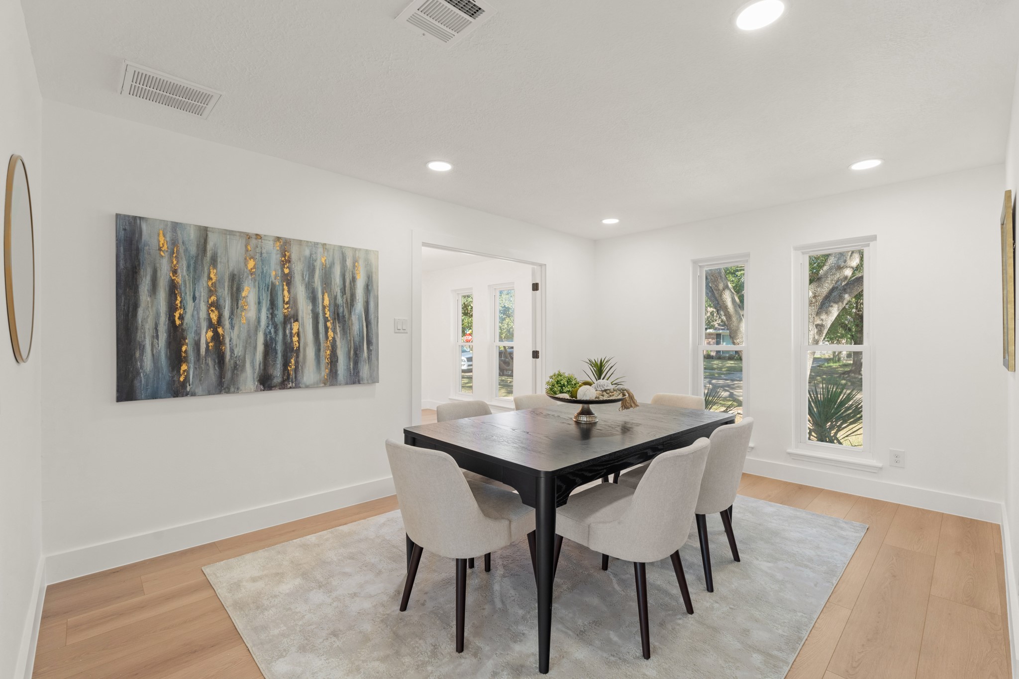 7631 Westwind Lane Houston, TX 77071 - Photo 6 of 21 a view of a dining room with furniture and wooden floor