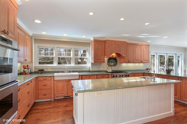804 Valley Road Lake Forest, IL 60045 - Photo 5 of 25 a kitchen with stainless steel appliances granite countertop a sink stove and cabinets