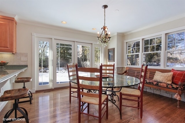 804 Valley Road Lake Forest, IL 60045 - Photo 6 of 25 a view of a dining room with furniture window and outside view