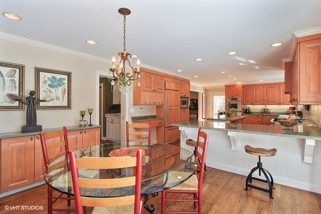 804 Valley Road Lake Forest, IL 60045 - Photo 7 of 25 a dining room filled with furniture and wooden floor