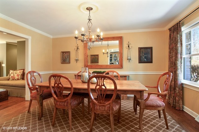 804 Valley Road Lake Forest, IL 60045 - Photo 9 of 25 a view of a dining room with furniture and chandelier