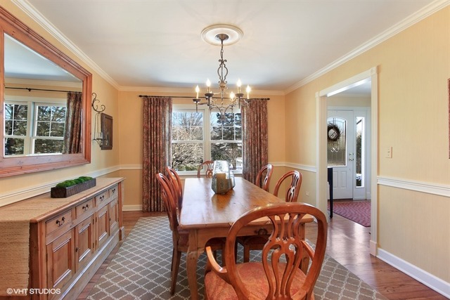 804 Valley Road Lake Forest, IL 60045 - Photo 10 of 25 a view of a dining room with furniture window and outside view