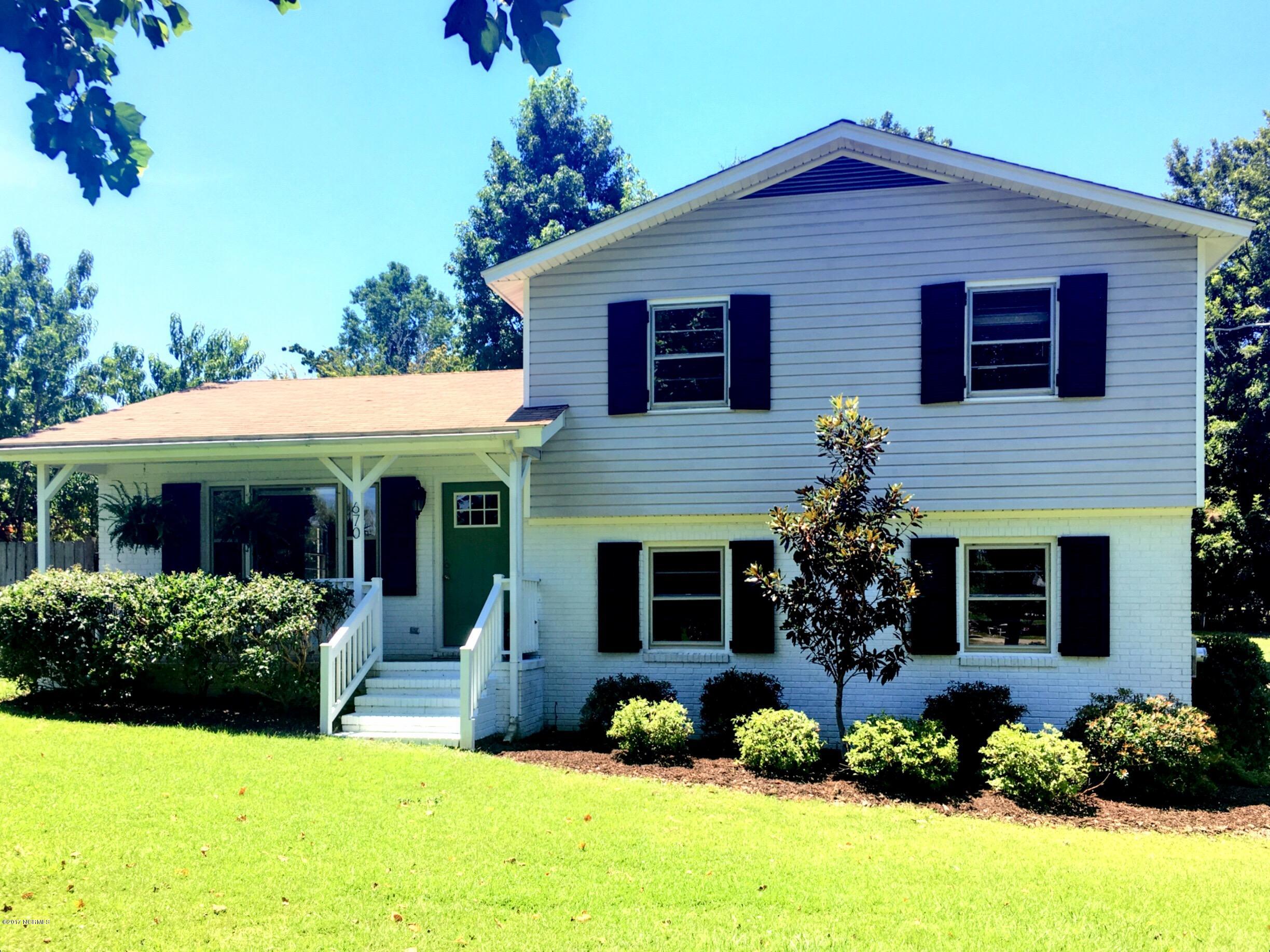 670 Hughes Road Hampstead, NC 28443 - Photo 1 of 29 Front 670 Hughes Rd.