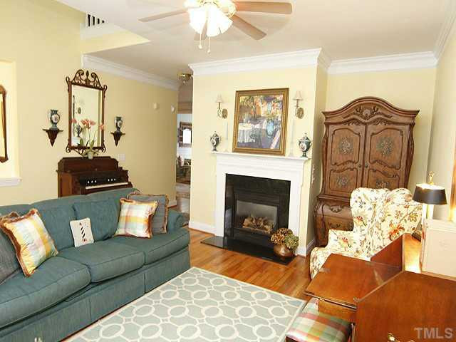 3913 Stags Leap Circle Raleigh, NC 27612 - Photo 5 of 16 Marble fireplace surround, gas logs and ceiling fan all make this a warm and inviting room. Living Room