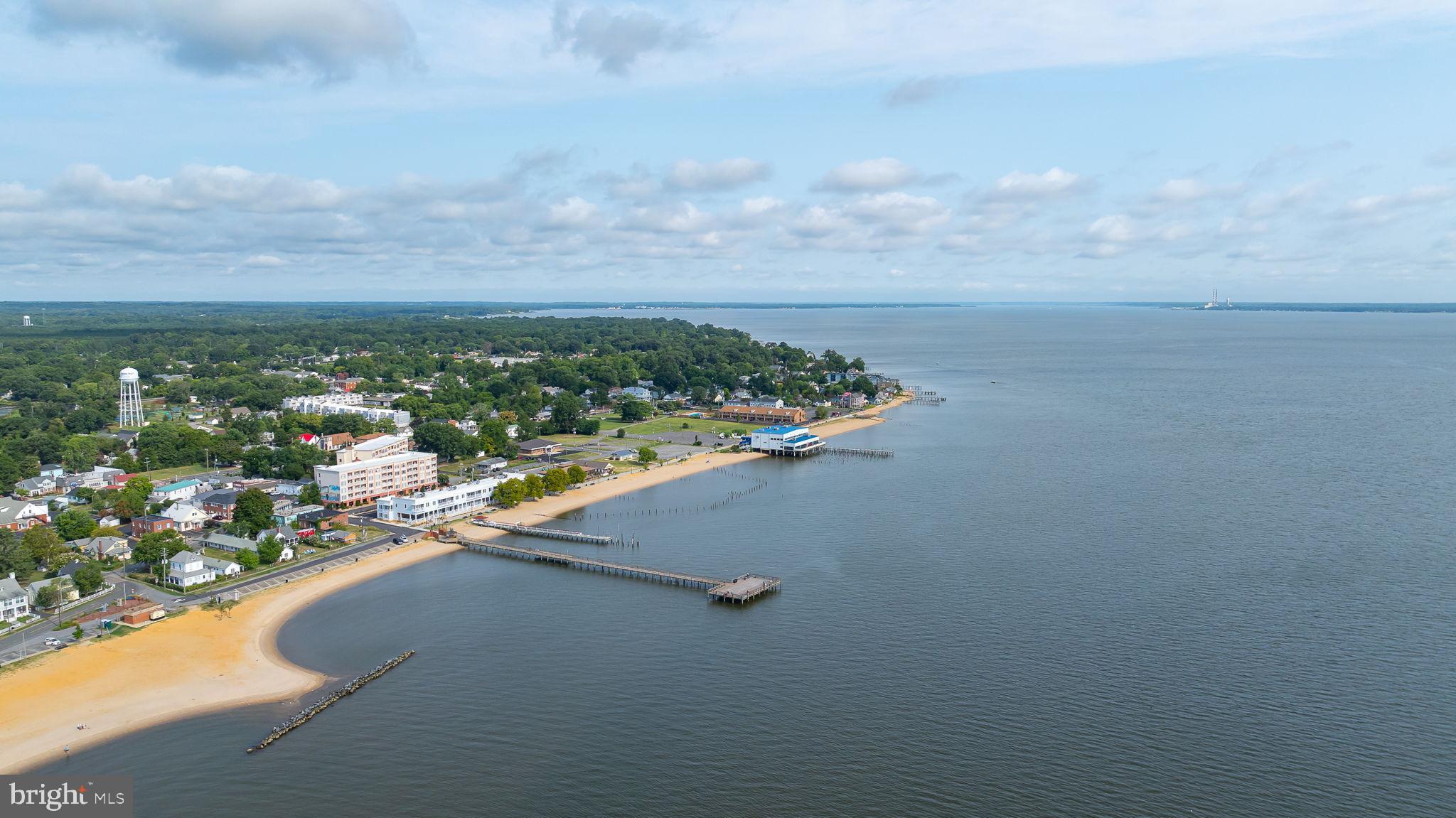312 9th Street Colonial Beach, VA 22443 - Photo 52 of 62 Serene waterfront view of a charming town.