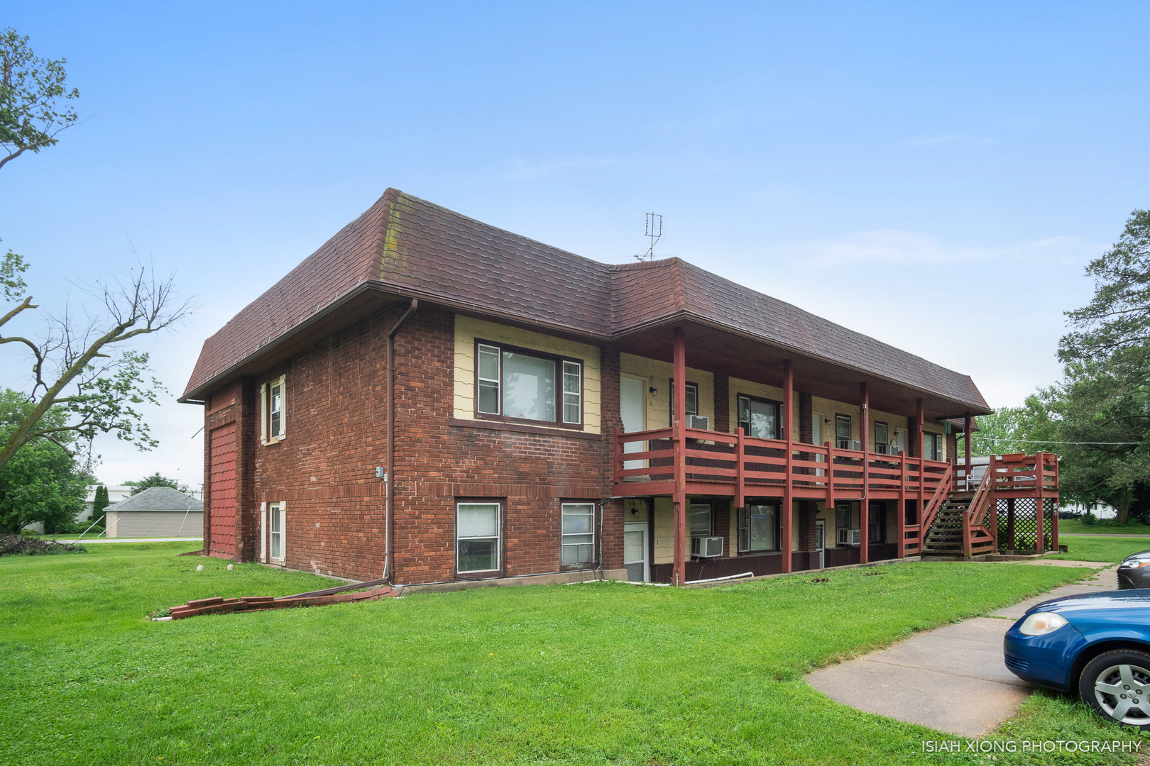 952 Harmon Road Harmon, IL 61042 - Photo 1 of 1 a front view of a house with a garden and deck