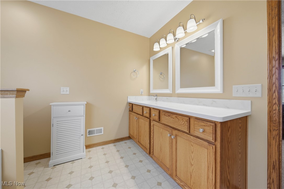 2132 Summerchase Road Northeast Canton, OH 44721 - Photo 27 of 49 Bathroom with light floors and vanity