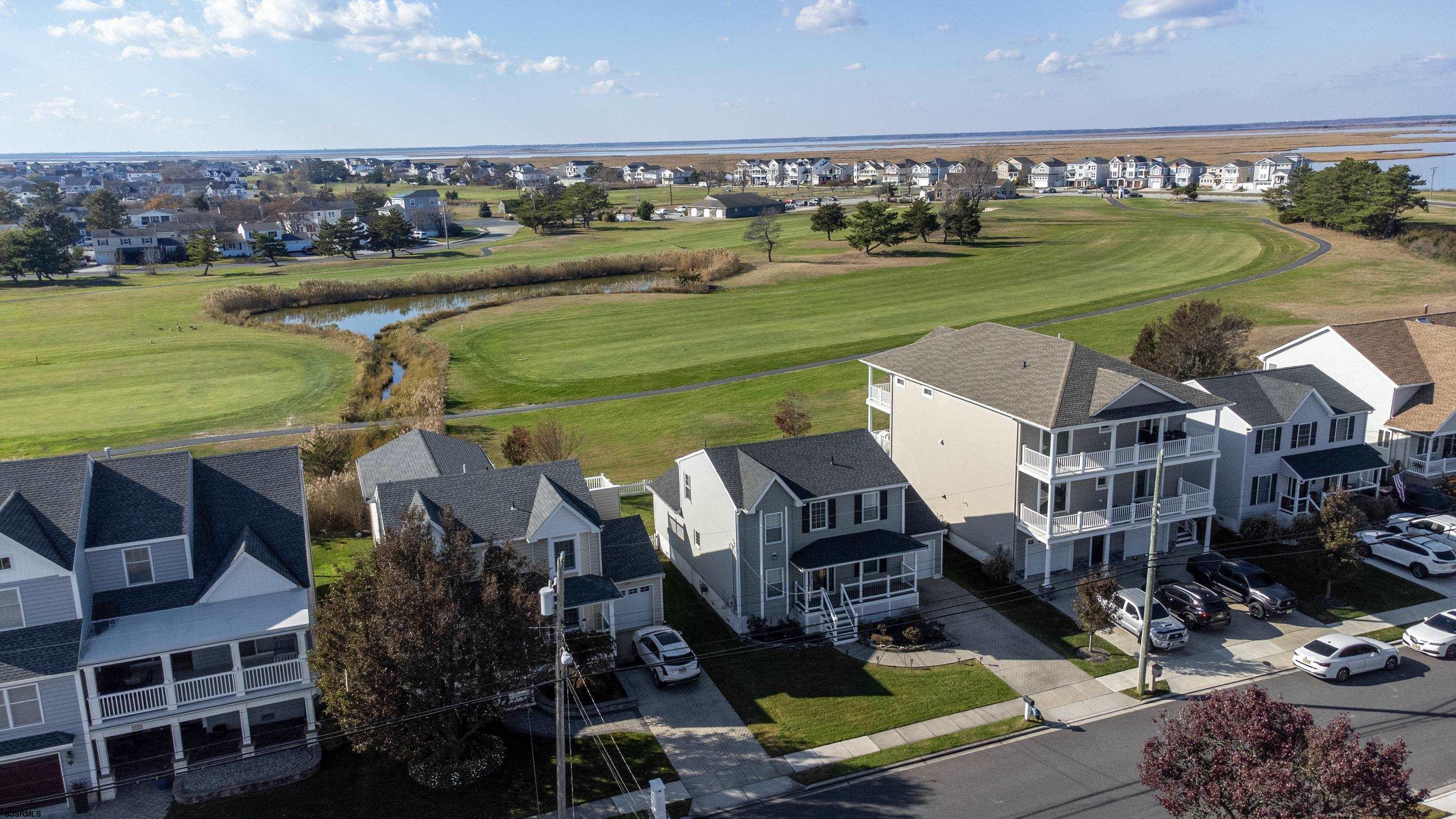 214 Hagen Road Brigantine, NJ 08203 - Photo 32 of 34 a view of a city with lawn chairs