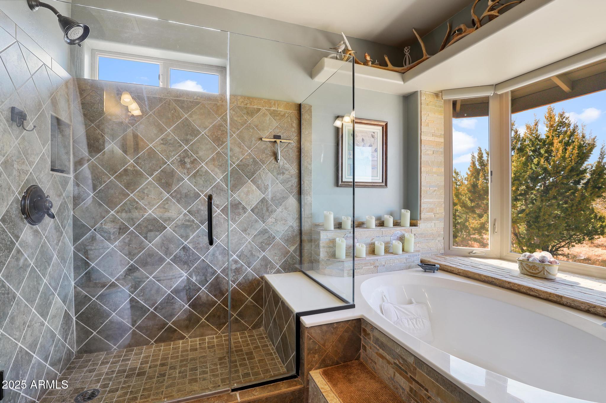 4018 Sunset Rdg Loop Happy Jack, AZ 86024 - Photo 21 of 46 a bathroom with a sink and mirror with bathtub