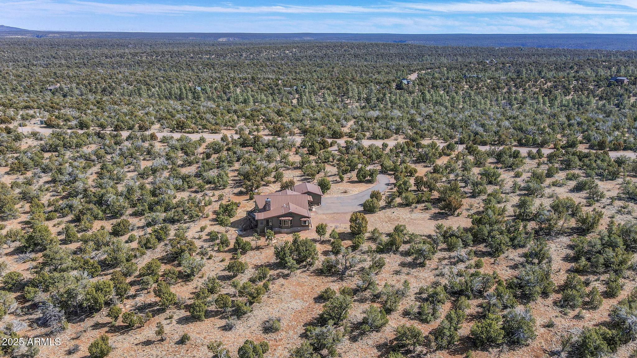 4018 Sunset Rdg Loop Happy Jack, AZ 86024 - Photo 42 of 46 a view of a city with mountain