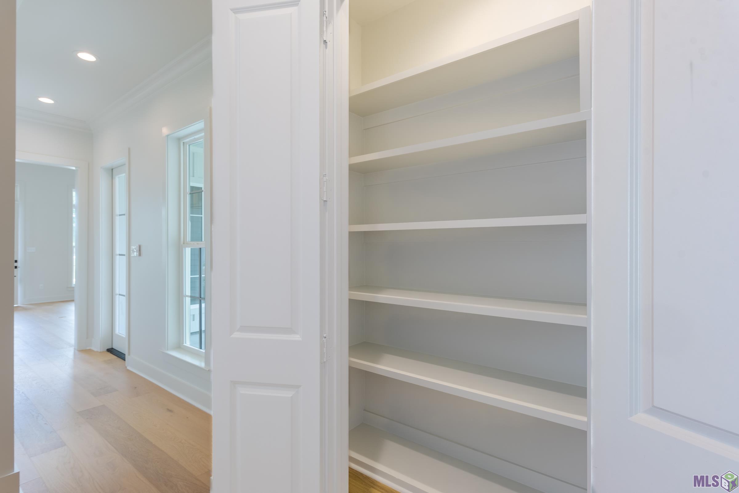 7517 McMahon Drive Baton Rouge, LA 70817 - Photo 9 of 13 Hall way closet