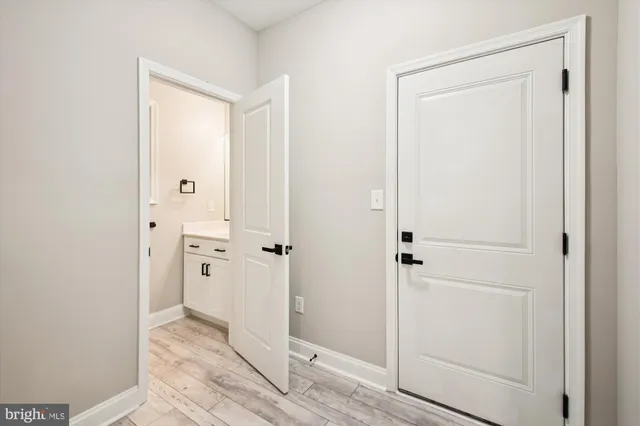 a view of a bathroom with a glass door