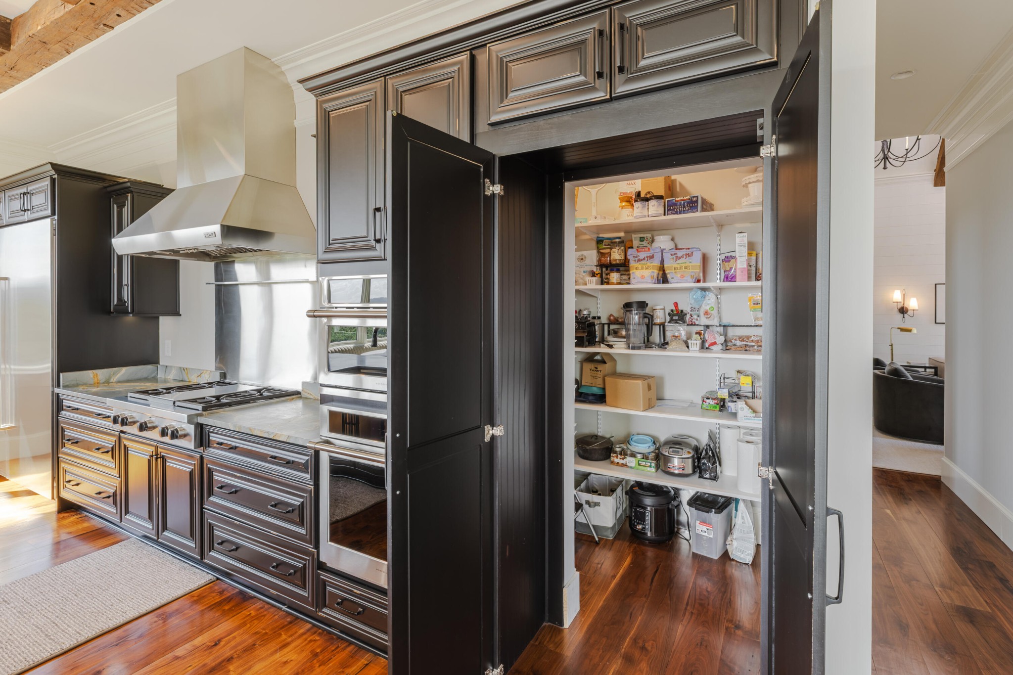 1129 Farmersville Road Summerville, GA 30747 - Photo 54 of 100 a kitchen with stainless steel appliances granite countertop a stove and a refrigerator