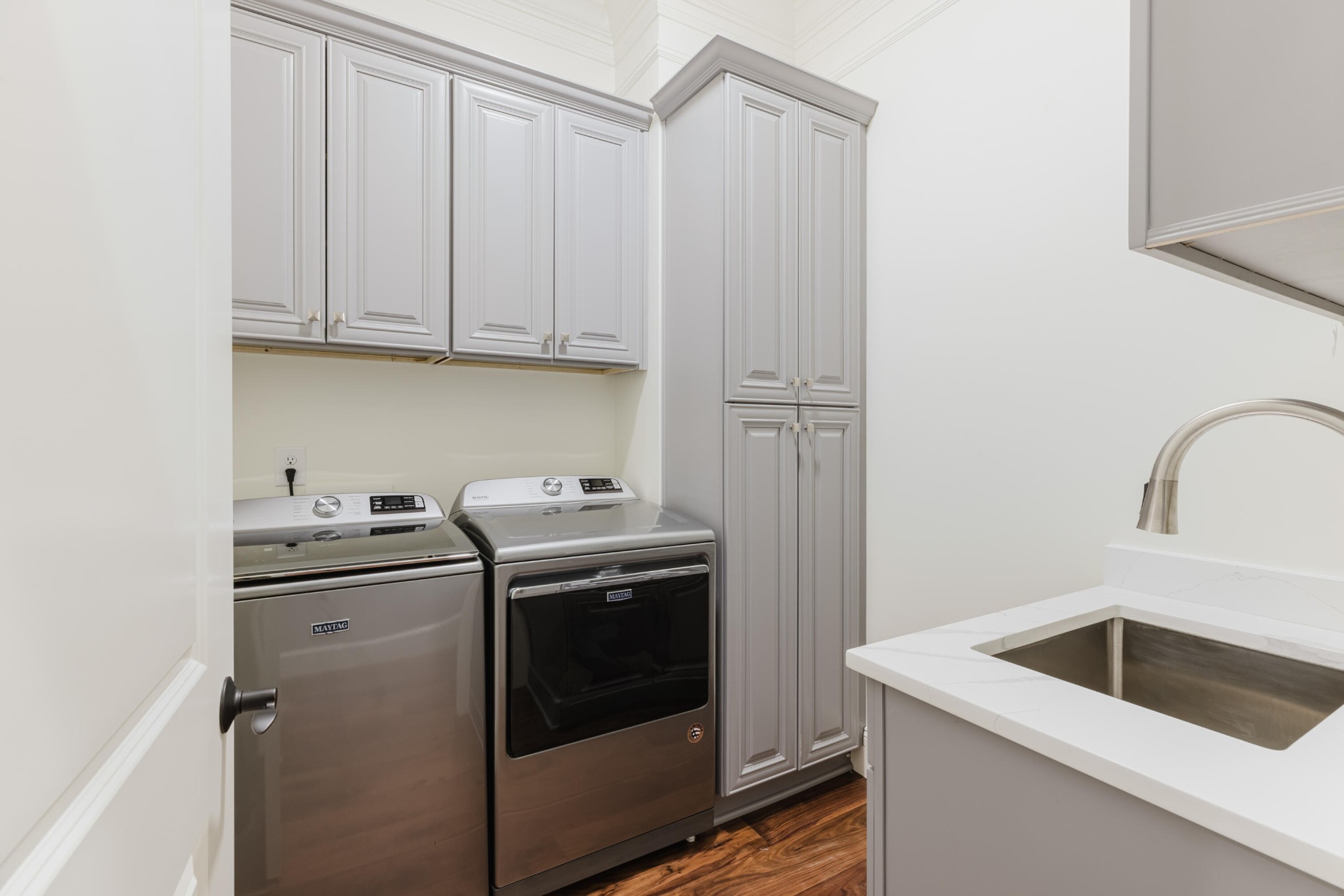 1129 Farmersville Road Summerville, GA 30747 - Photo 70 of 100 a kitchen with granite countertop white cabinets and white appliances