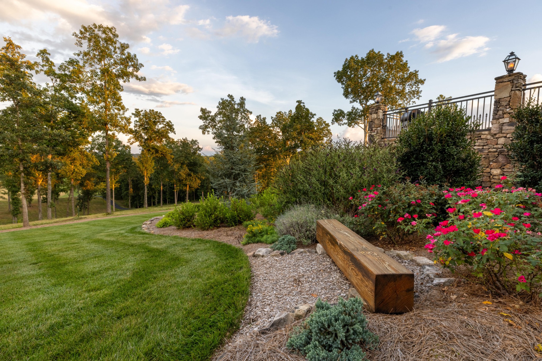 1129 Farmersville Road Summerville, GA 30747 - Photo 78 of 100 a view of a garden with flowers and trees