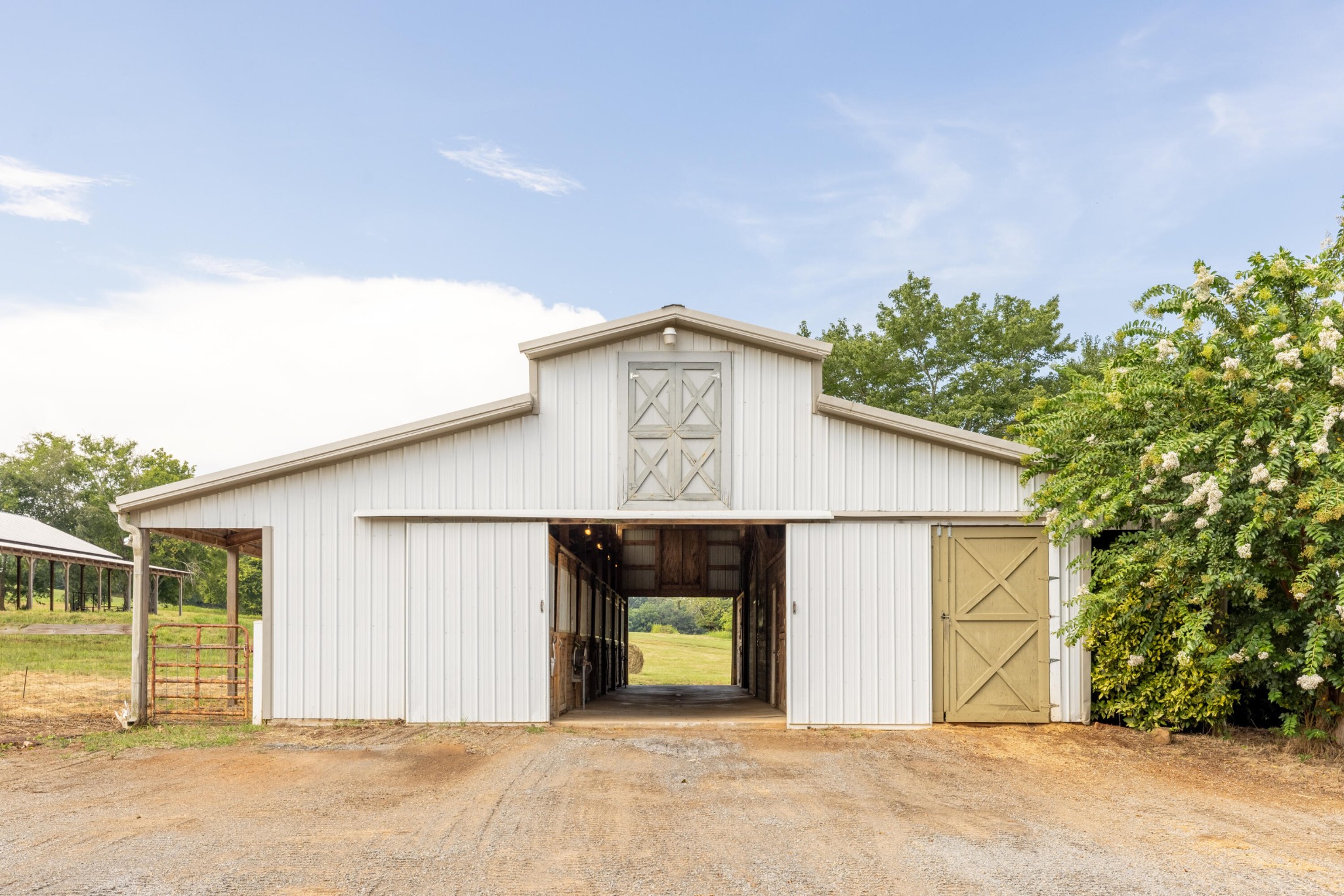 1129 Farmersville Road Summerville, GA 30747 - Photo 90 of 100 a view of a house with garage and yard