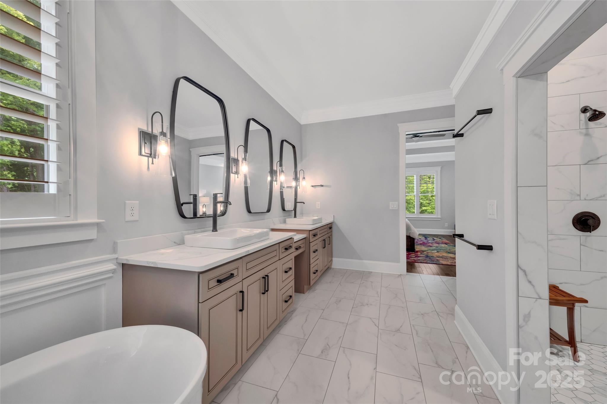 1622 Hunters Place Road York, SC 29745 - Photo 19 of 39 a spacious bathroom with a granite countertop sink a mirror a vanity and a bathtub