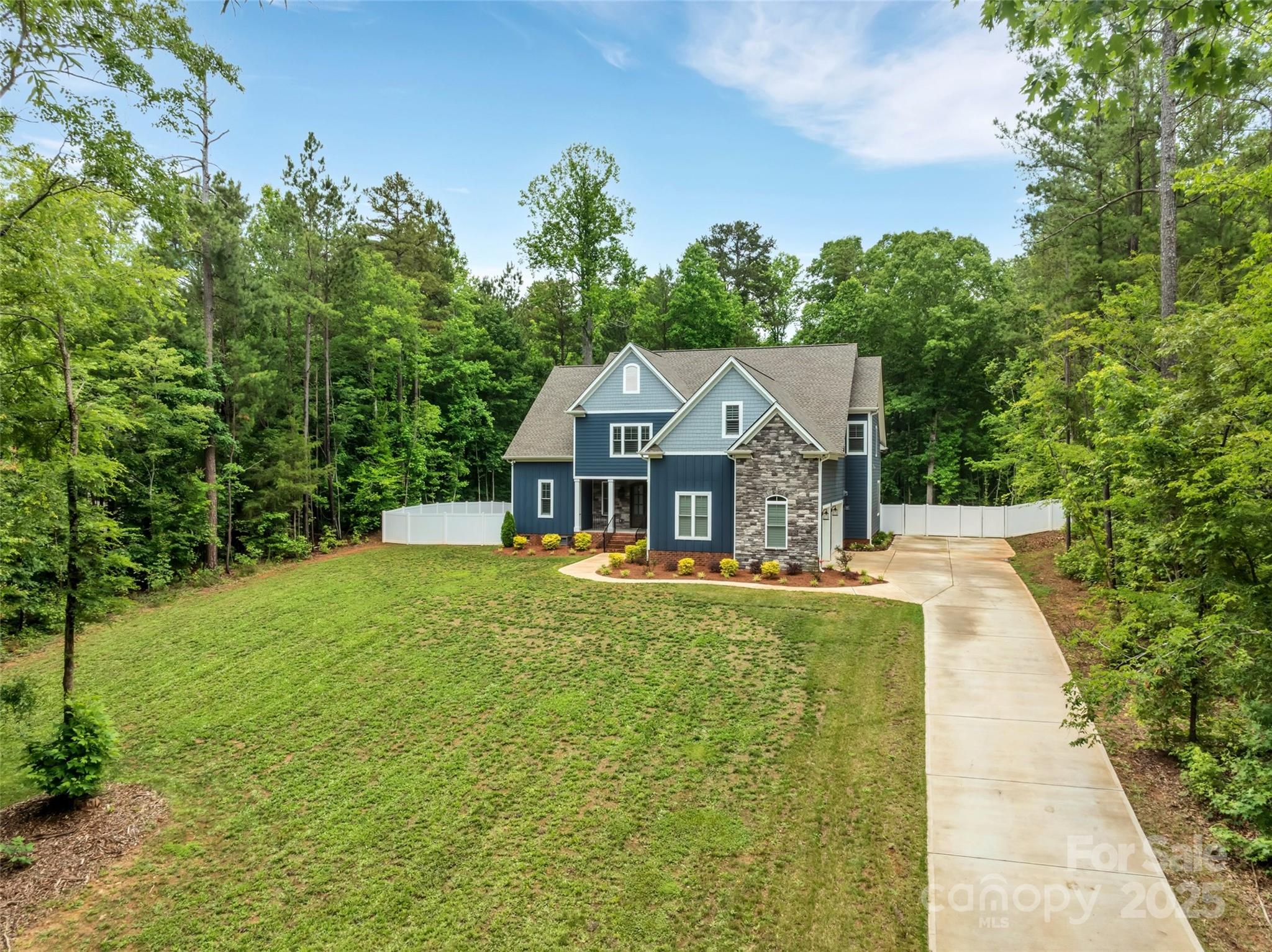 1622 Hunters Place Road York, SC 29745 - Photo 2 of 39 a front view of house with yard and green space