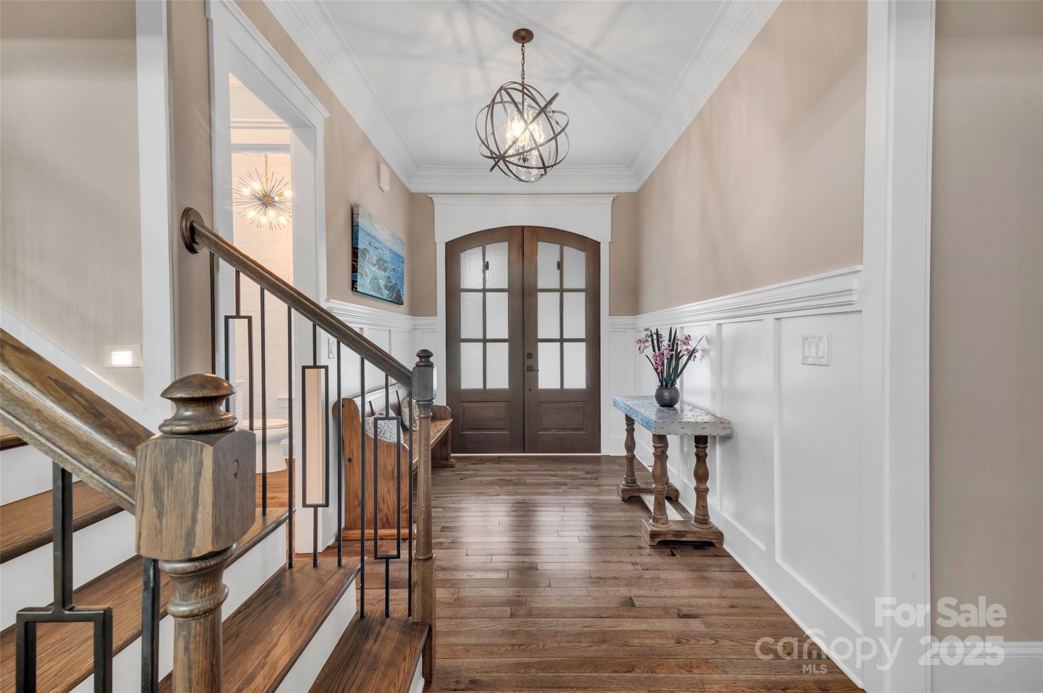 1622 Hunters Place Road York, SC 29745 - Photo 3 of 39 a view of entryway with wooden floor and a chandelier