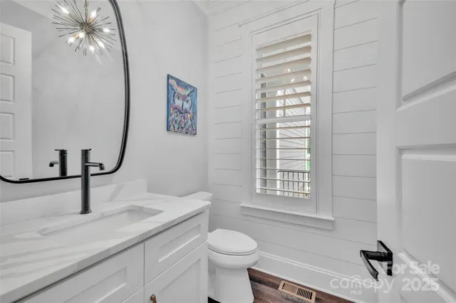 a hallway with washer and dryer