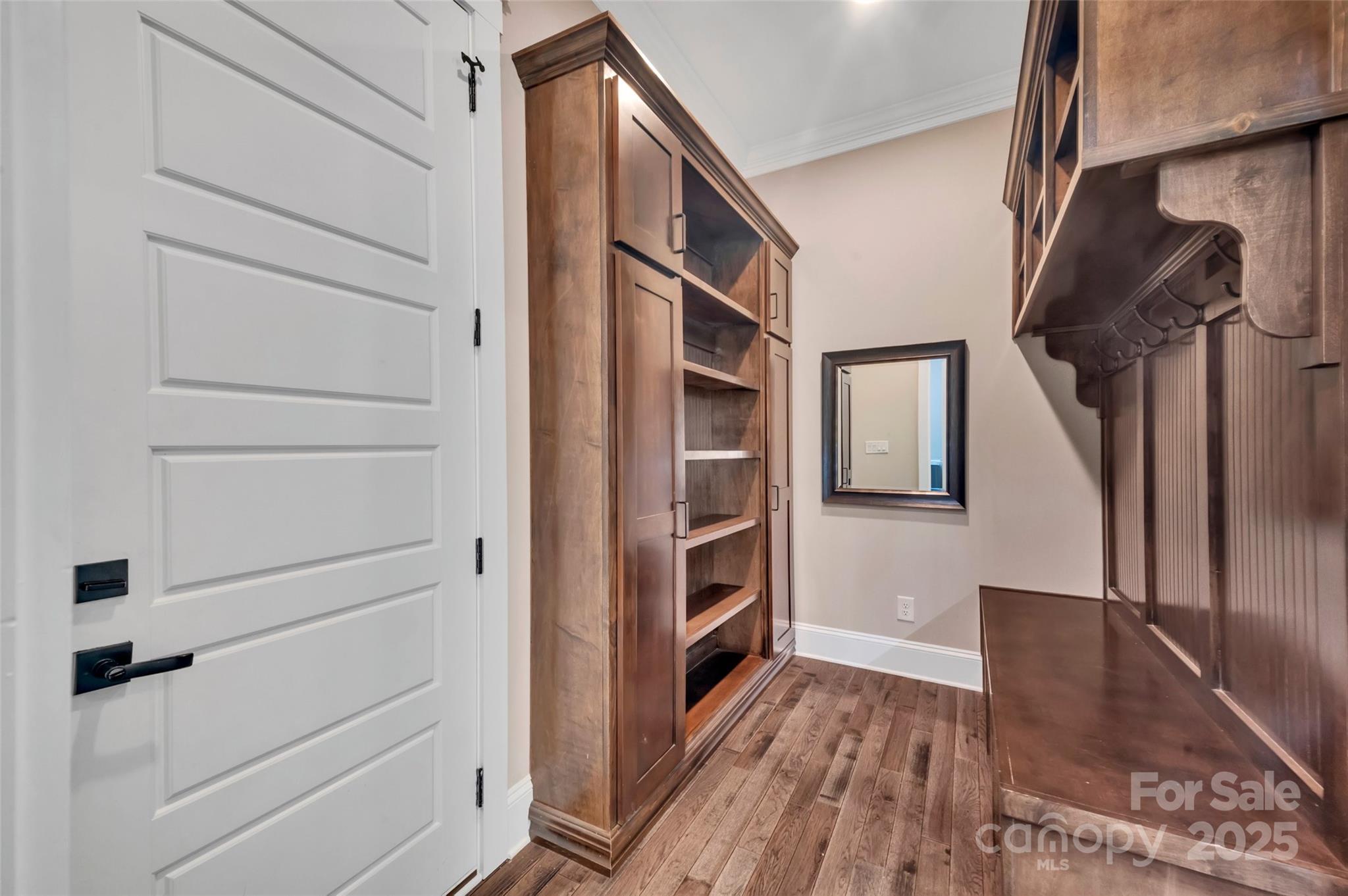 1622 Hunters Place Road York, SC 29745 - Photo 32 of 39 a view of walk in closet with clothes and shoes