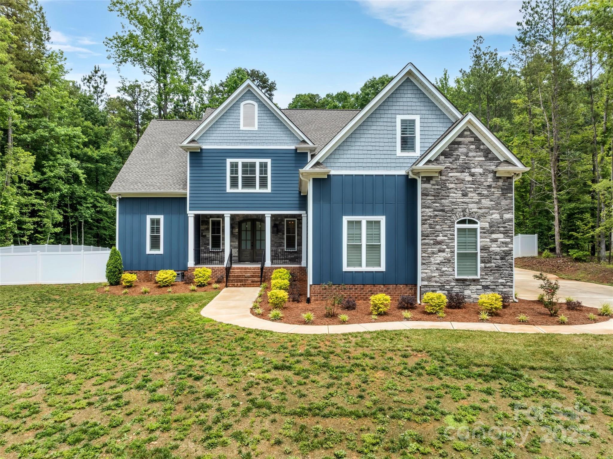 1622 Hunters Place Road York, SC 29745 - Photo 39 of 39 a front view of a house with outdoor seating