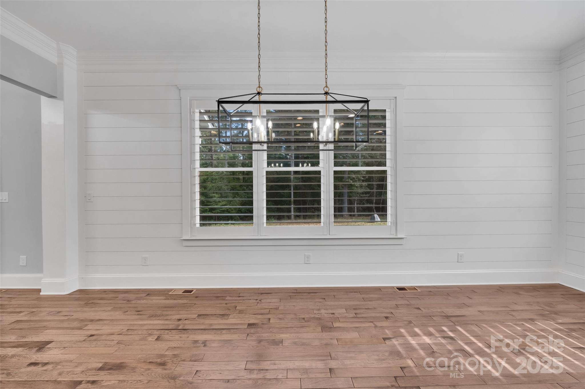 1622 Hunters Place Road York, SC 29745 - Photo 10 of 39 a view of a livingroom with wooden floor and a window