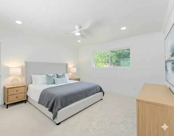 a bedroom with a bed and a dresser